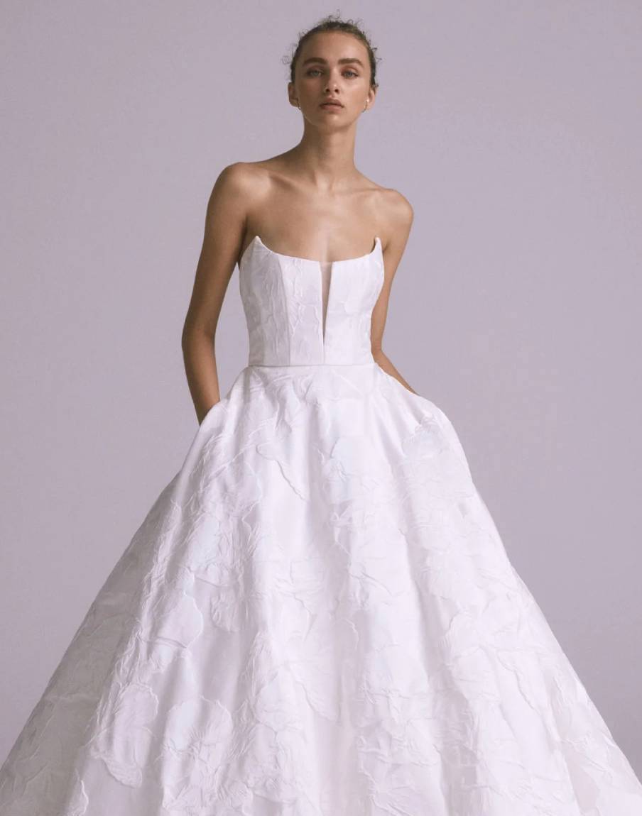 Model wearing a gown by Amsale