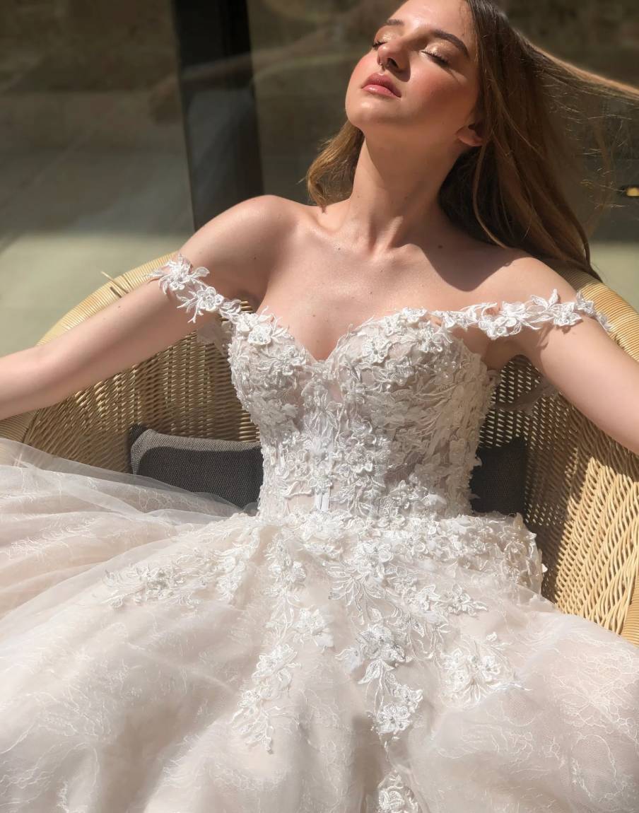 Image 36: Model wearing a gown by Karin Shemesh