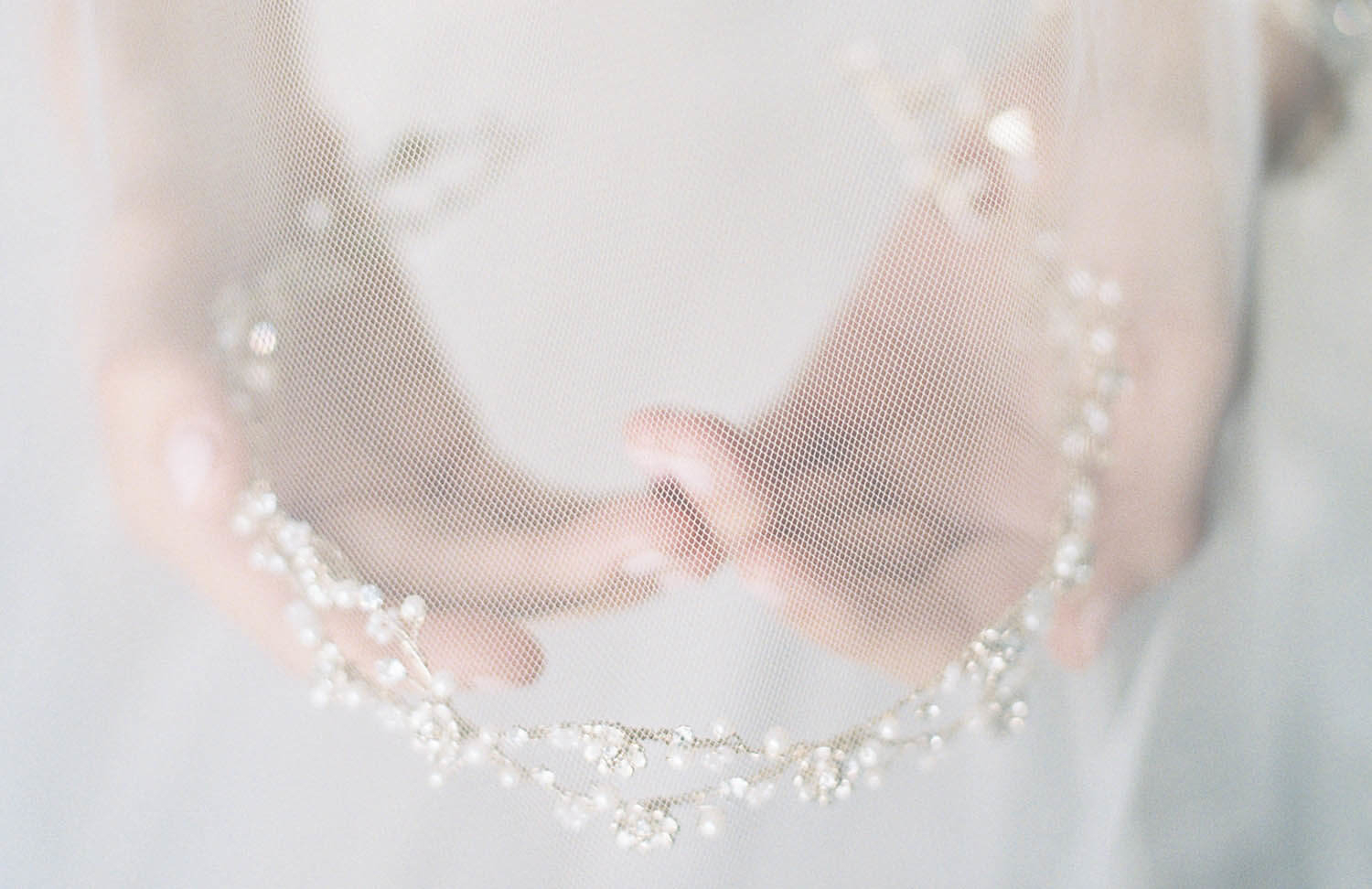 Model wearing a white gown